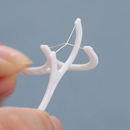 Fil dentaire DENTAL FLOSSI avec manche